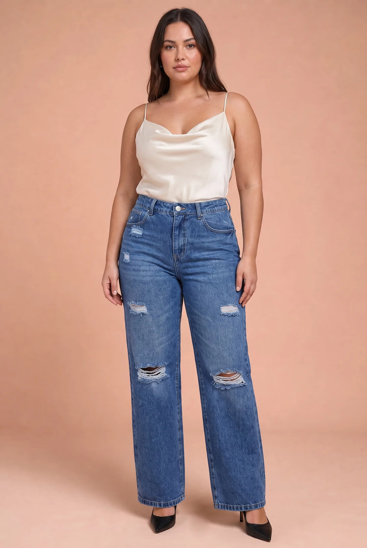 Zerrissene blaue Jeans mit weitem Schnitt
